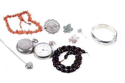 Lot 112 - 19th Century and later costume jewellery including: a cherry amber style beaded necklace