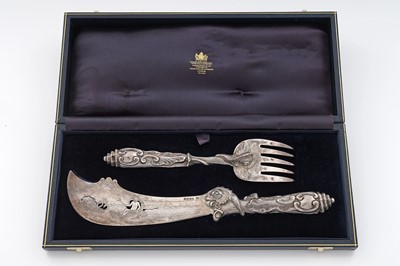 Lot 207 - A pair of Victorian cast silver fish servers
