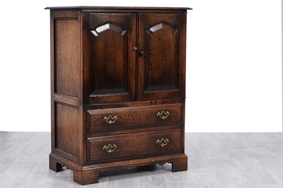 Lot 67 - Attributed to Titchmarsh & Goodwin: a Georgian style oak tv/hifi cabinet
