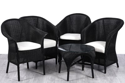 Lot 428 - Lloyd Loom: four wicker armchairs and a coffee table