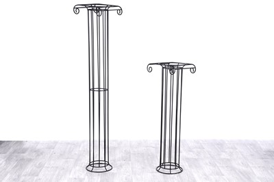 Lot 431 - Two black painted wrought metal jardinière stands