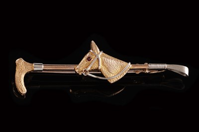 Lot 11 - An early 20th Century 9ct yellow gold riding interest brooch