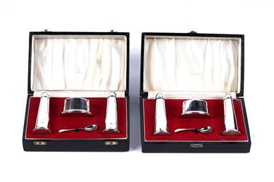 Lot 209 - A pair of Eliabeth II silver cruet sets of Minimalist design