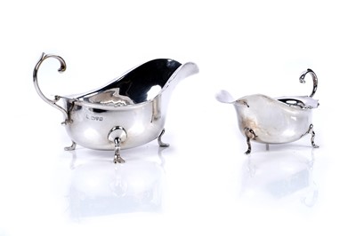 Lot 190 - A pair of early George V silver sauce boats