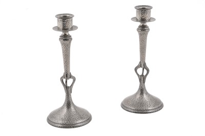 Lot 398 - Retailed by Northern Goldsmiths: a pair of Art Nouveau pewter candlesticks