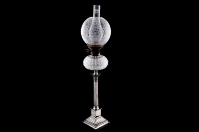 Lot 147 - A late Victorian silver mounted oil lamp