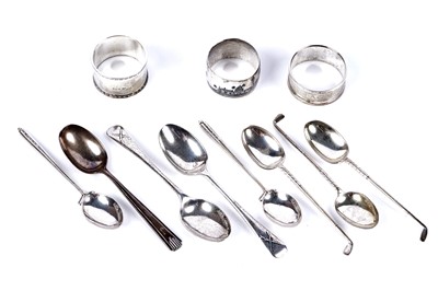 Lot 173 - Novelty silver spoons of golfing/shooting interest; and napkin rings