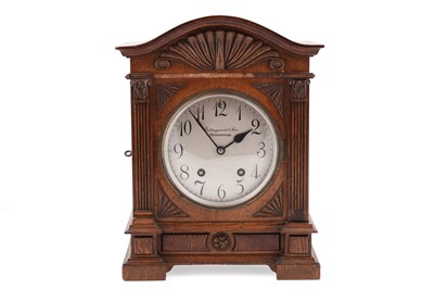 Lot 202 - Lenzkirch: an early 20th Century oak 8-day mantel clock