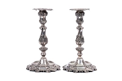 Lot 42 - A pair of late 19th Century Portuguese cast silver candlesticks
