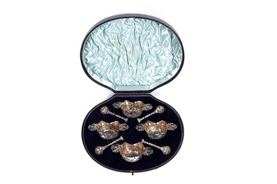 Lot 96 - A late Victorian cased set of four silver salts