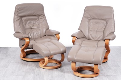 Lot 90 - Himolla: a pair of 'Zerostress' tan leather reclining armchairs and stools