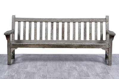 Lot 414 - Lister, Dursley: a large teak garden bench