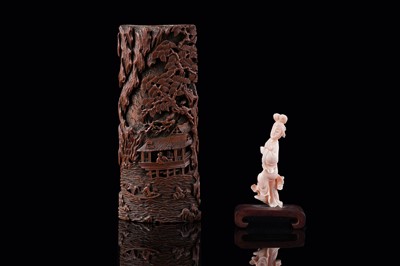 Lot 832 - A Chinese pink coral figure; and a bamboo section carving