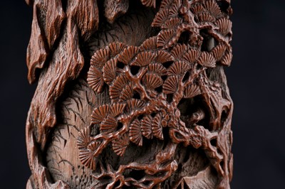 Lot 832 - A Chinese pink coral figure; and a bamboo section carving