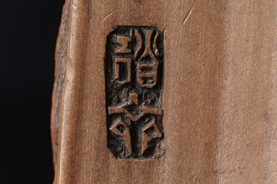 Lot 832 - A Chinese pink coral figure; and a bamboo section carving