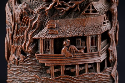 Lot 832 - A Chinese pink coral figure; and a bamboo section carving