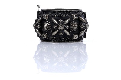 Lot 53 - Silver bracelets including: a Siamese plaque bracelet