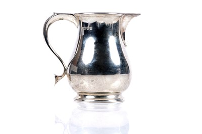 Lot 204 - An Elizabeth II silver cream jug