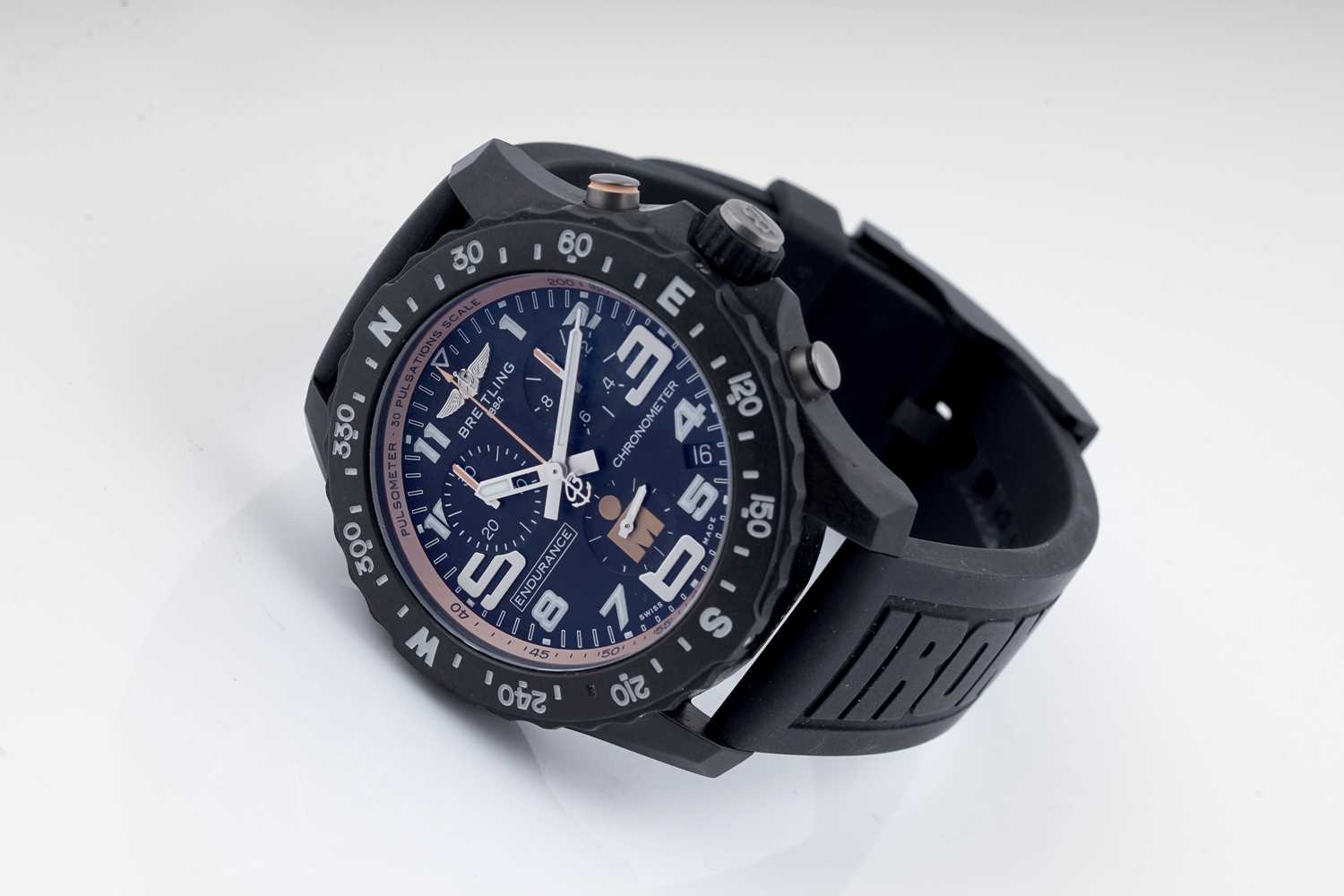 Lot 151 - Breitling Endurance Pro Ironman Finisher: a quartz chronograph calendar wristwatch