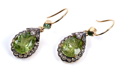 Lot 47 - A pair of peridot and diamond drop earrings