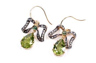Lot 49 - A pair of peridot and diamond drop earrings