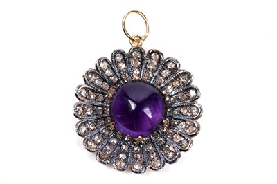 Lot 52 - An amethyst and diamond flowerhead pattern pendant