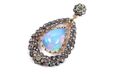 Lot 53 - A water-opal, emerald and diamond pendant
