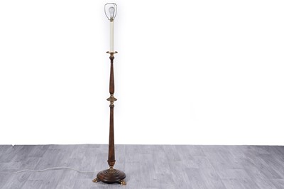 Lot 259 - An empire style beech and brass mounted standard lamp