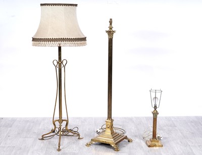 Lot 196 - Three brass lamps