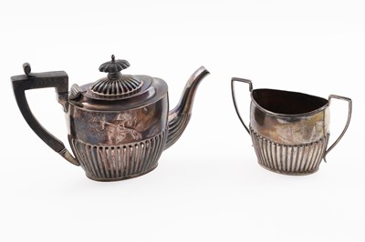 Lot 109 - A silver bachelor’s teapot and two handled sugar bowl