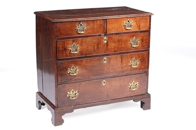 Lot 1080 - A Georgian oak straight front chest of drawers