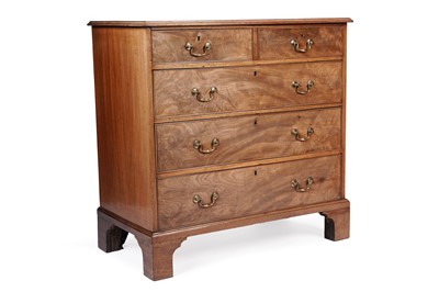 Lot 1085 - A Georgian walnut straight front chest of drawers