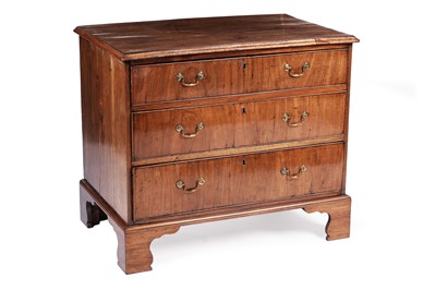 Lot 1086 - A Georgian walnut straight front chest of drawers