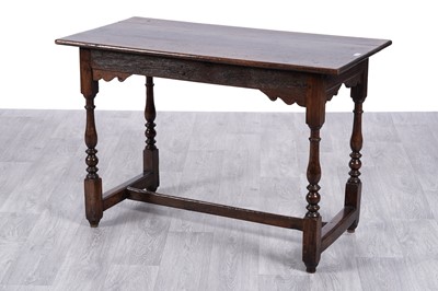 Lot 39 - A Georgian and later oak table