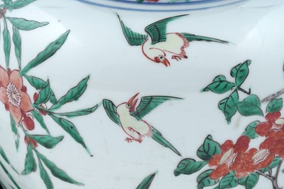 Lot 816 - A Chinese Wucai jar and cover