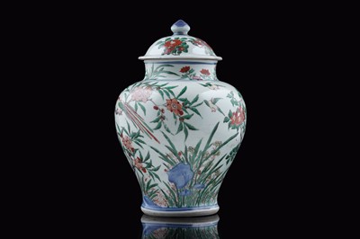 Lot 816 - A Chinese Wucai jar and cover