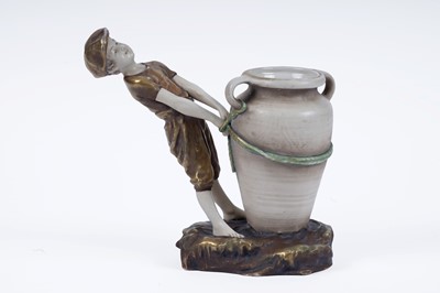 Lot 366 - An early 20th Century Imperial Amphora Austrian porcelain figure of a boy