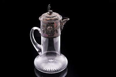 Lot 144 - A Victorian silver mounted clear glass claret jug