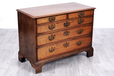 Lot 83 - A George III walnut chest of drawers