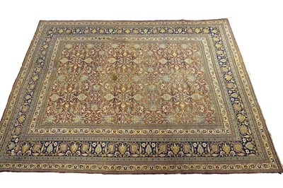 Lot 988 - A Persian hand-made Dorokhsh carpet