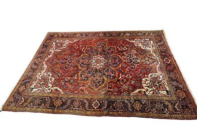Lot 996 - A Persian hand-made Heriz carpet