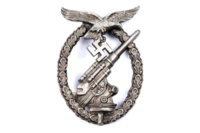 Lot 738 - A German Second World War Anti-Aircraft Luftwaffe war badge