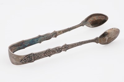Lot 87 - A Victorian pair of "Twas the Night Before Christmas" novelty sugar tongs