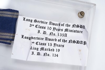 Lot 973 - A display of three German Third Reich Long Service Awards of the NSDAP