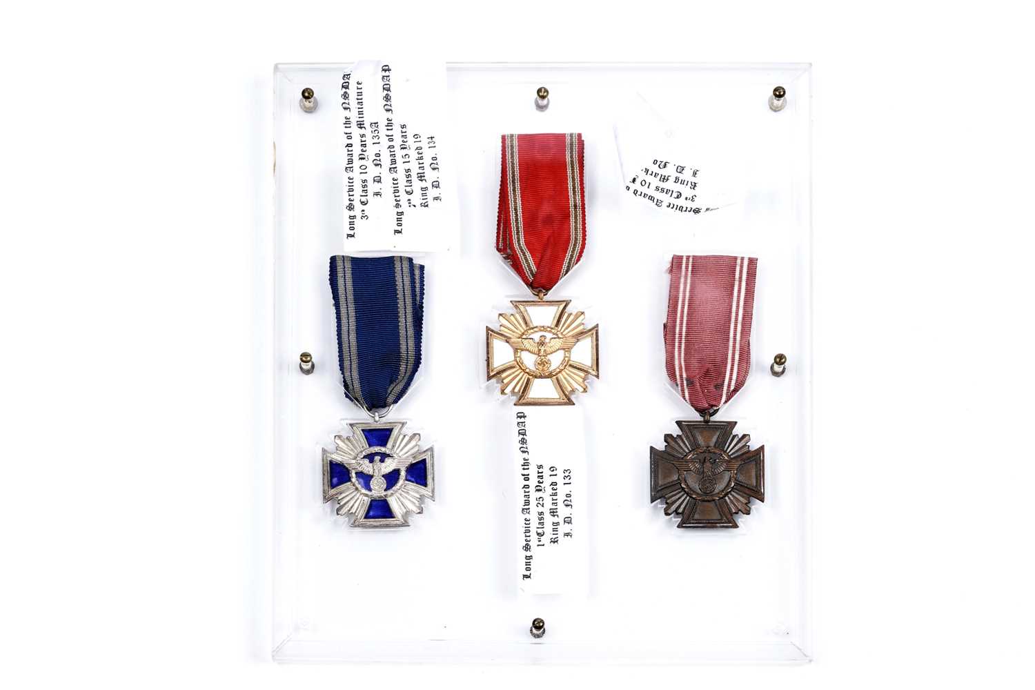 Lot 973 - A display of three German Third Reich Long Service Awards of the NSDAP