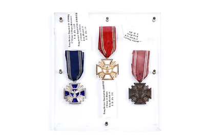Lot 973 - A display of three German Third Reich Long Service Awards of the NSDAP