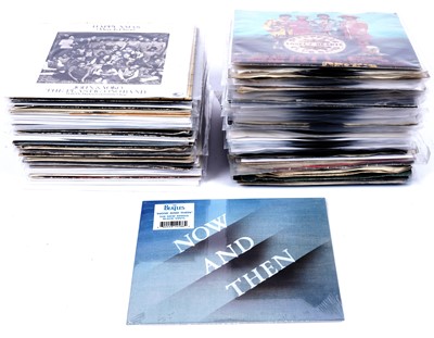 Lot 304 - Beatles singles; and related Apple singles