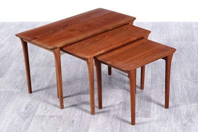 Lot 132 - A mid-20th Century teak nest of three tables