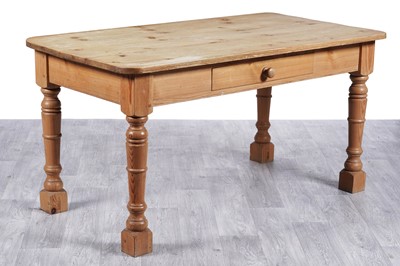 Lot 61 - A rustic style pine farmhouse dining table