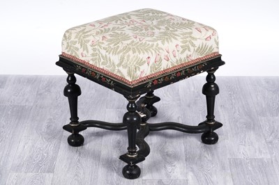 Lot 85 - A late 19th Century ebonized and parcel gilt stool